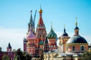 Saint Basil's Cathedral with colorful onion domes against a clear blue sky in Moscow
